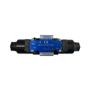 A blue and black Yuken D03 solenoid directional control valve with terminal box type electrical connection.