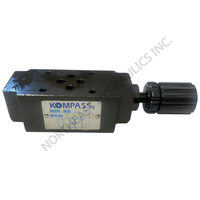 Black mechanical component with 'Kompass' branding on a white background